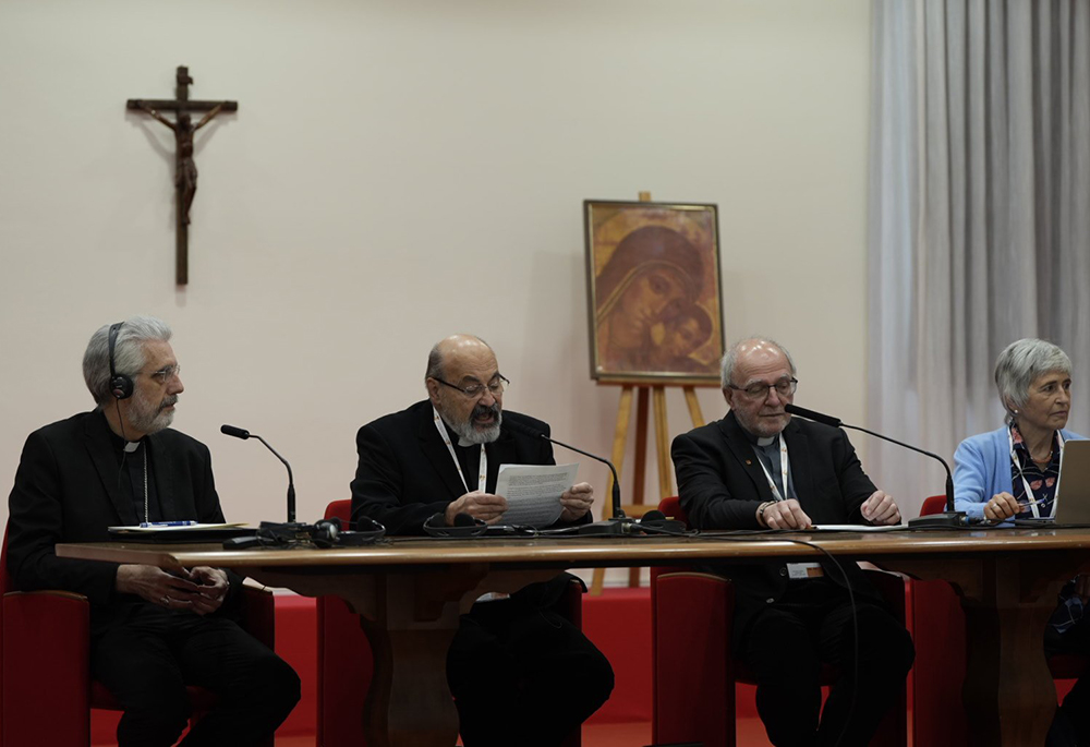 Fr. Tomas Halik, second from left, speaks at a meeting of parish priests April 29 at Sacrofano, outside of Rome. Other speakers include, from left: Bishop Luis Marín de San Martín, synod undersecretary; Canadian Fr. Gilles Routhier; and María Lía Zervino, sociologist and former president of the World Union of Catholic Women's Organizations. (CNS/Courtesy of the Synod of Bishops)