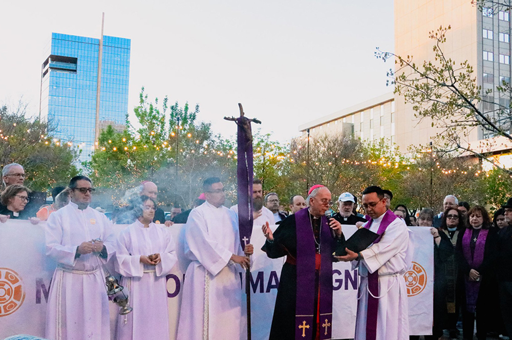 Bishop Mark Seitz of El Paso, Texas, leads the community in prayer at the march “Do Not Be Afraid: March and Vigil for Human Dignity” before hundreds process toward Sacred Heart Church in El Paso for a prayer vigil for the respect of migrants’ rights on March 21, 2024. (OSV News/Courtesy of Hope Border Institute/Diego Adame)