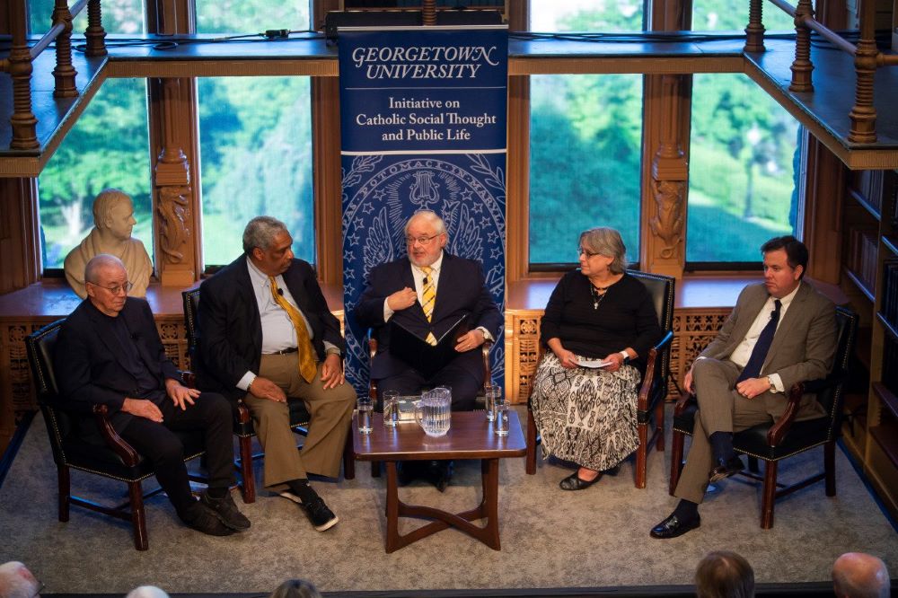 Ralph McCloud (second from left), then- director of the U.S. bishops' Catholic Campaign for Human Development, participates in a panel discussion on the debt ceiling May 31, 2023, at Georgetown. 