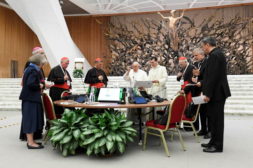 Pope Francis gives his blessing at the conclusion of the assembly of the Synod of Bishops' last working session Oct. 28, 2023, in the Paul VI Hall at the Vatican.