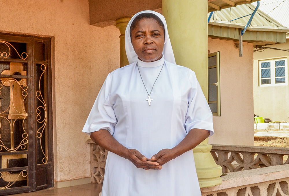 Sr. Cordelia Anekwem of the Tertiary Sisters of St. Francis poses in front of her convent in Gboko, Nigeria, Jan. 31. (GSR photo/Valentine Benjamin)