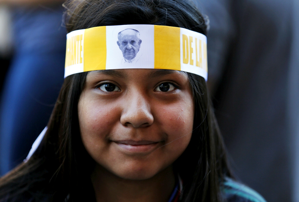 Tracy Pineda from Mexico wears a headband featuring Pope Francis after she greeted him outside the Cathedral of St. Matthew the Apostle Sept. 23, 2015, in Washington. (CNS/Reuters/Yuri Gripas)