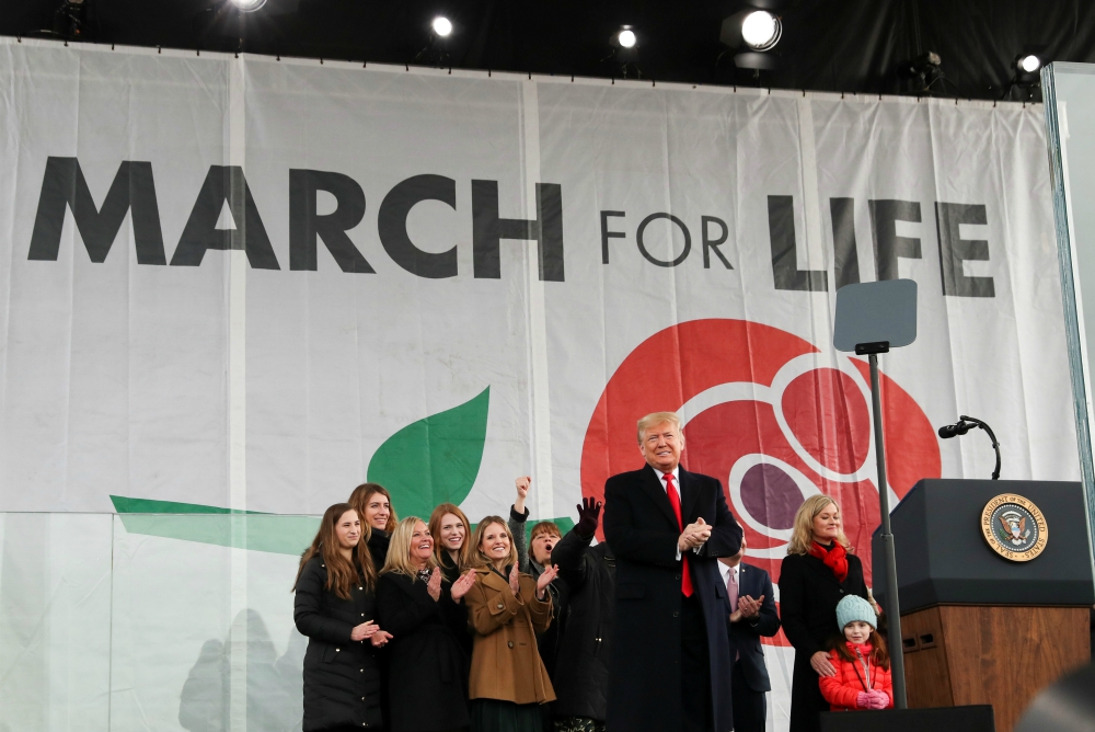 U.S. President Donald Trump applauds after addressing thousands during the 47th annual March for Life in Washington Jan. 24. (CNS/Reuters/Leah Millis)