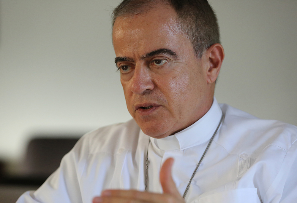 Archbishop Roberto Gonzalez Nieves of San Juan, Puerto Rico, gestures during a 2017 interview in San Juan. (CNS/Bob Roller)