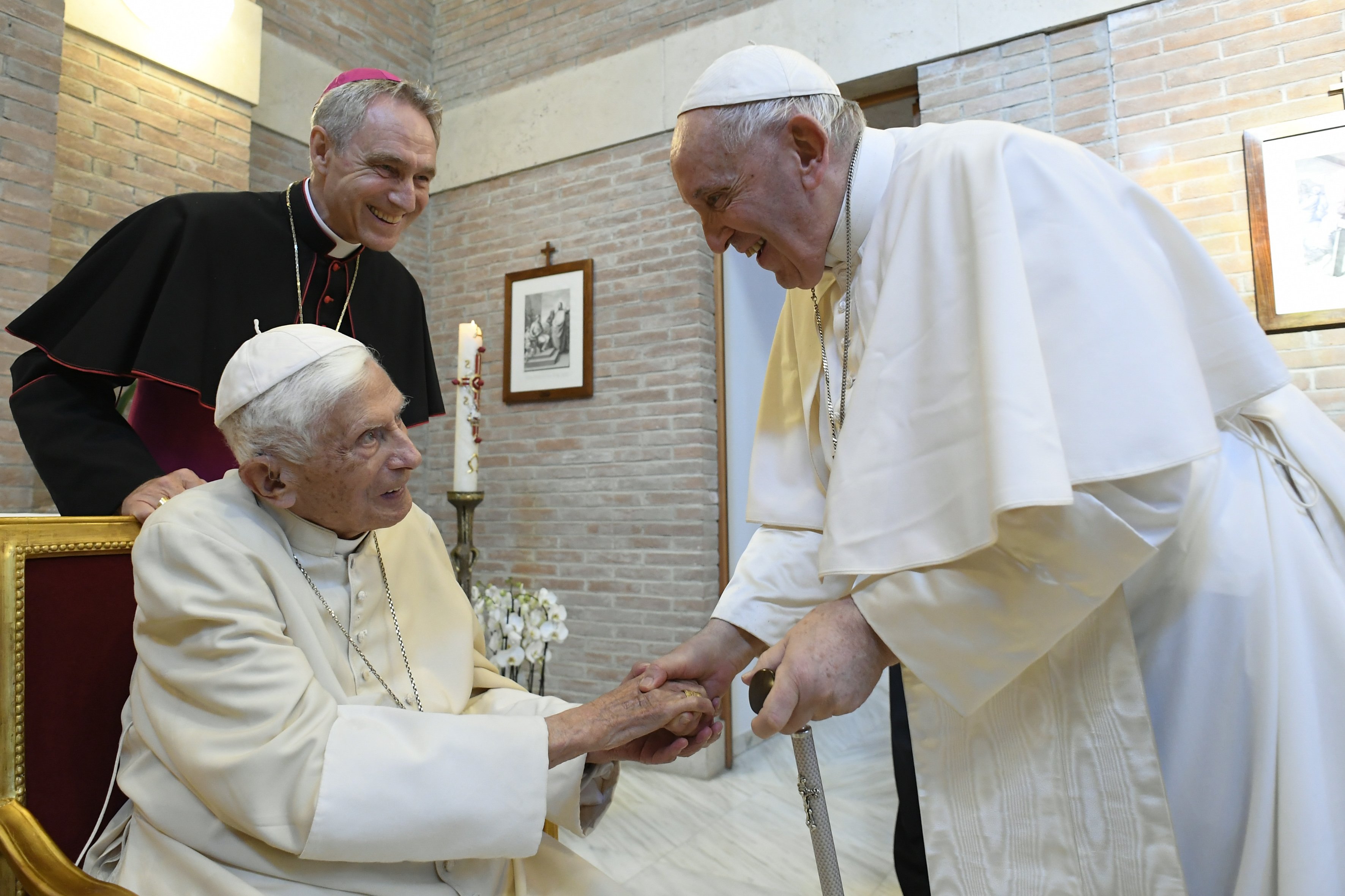 Pope Francis greets Pope Benedict