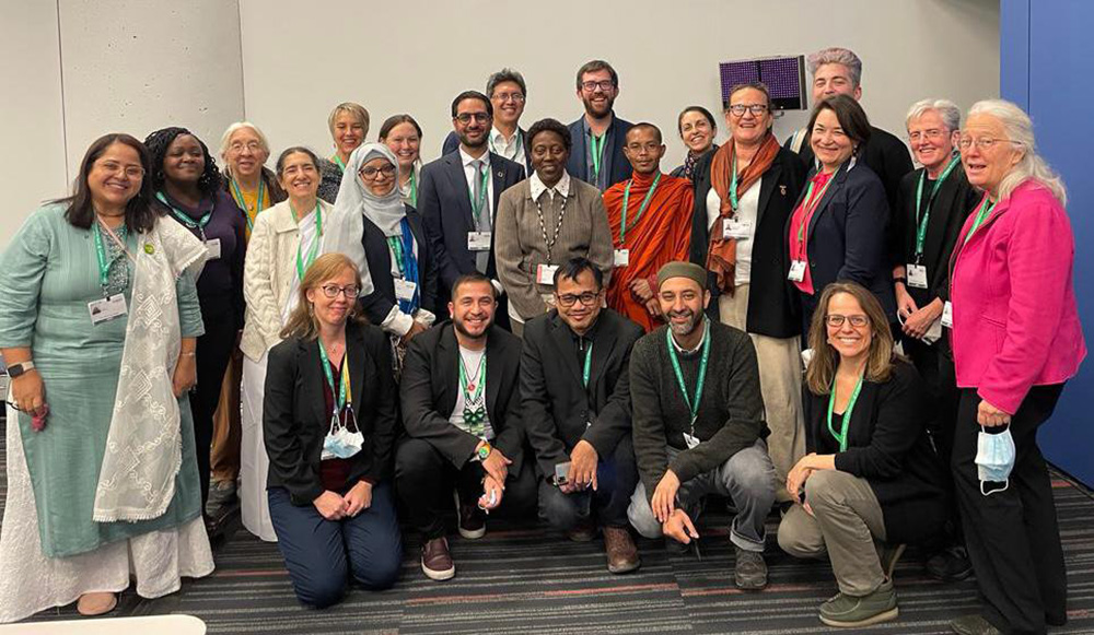Roughly 20 representatives of faith-based organizations meet with Elizabeth Mrema (center), executive secretary of the U.N. Convention on Biological Diversity on Dec. 12 during COP15. (Courtesy of Faiths at COP15/Wesley Cocozello)