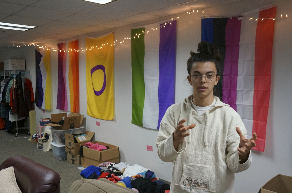 Sean Fisher, one of the student coordinators for QPLUS, the LGBTQ student organization for the College of St. Benedict and St. John's University, stands in the organization's dedicated lounge on the college's campus in St. Joseph, Minnesota, on Nov. 8. (AP/Giovanna Dell'Orto)