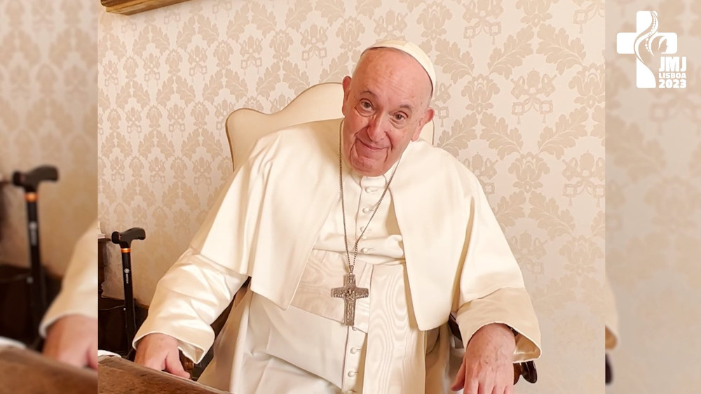 Pope Francis looks to the side in a video screen grab with the Lisboa 2023 World Youth Day logo