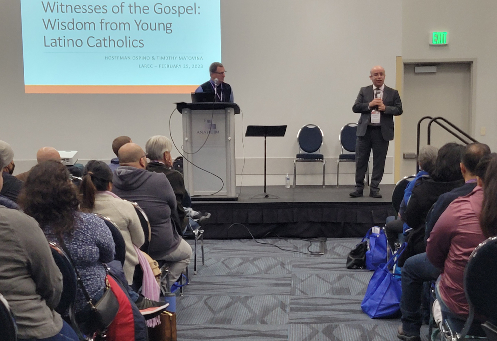 Timothy Matovina, left, and Hosffman Ospino give a workshop on ministry for young Latinos and Latinas during the Los Angeles Religious Education Congress Feb. 25 in Anaheim, California. (NCR photo/Heidi Schlumpf)