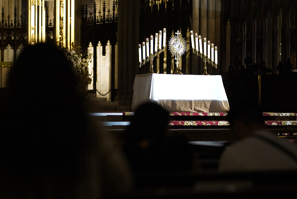 A monstrance containing the Blessed Sacrament is displayed on the altar during a Holy Hour at St. Patrick's Cathedral in New York City July 13, during the ongoing National Eucharistic Revival. (OSV News/Gregory A. Shemitz)