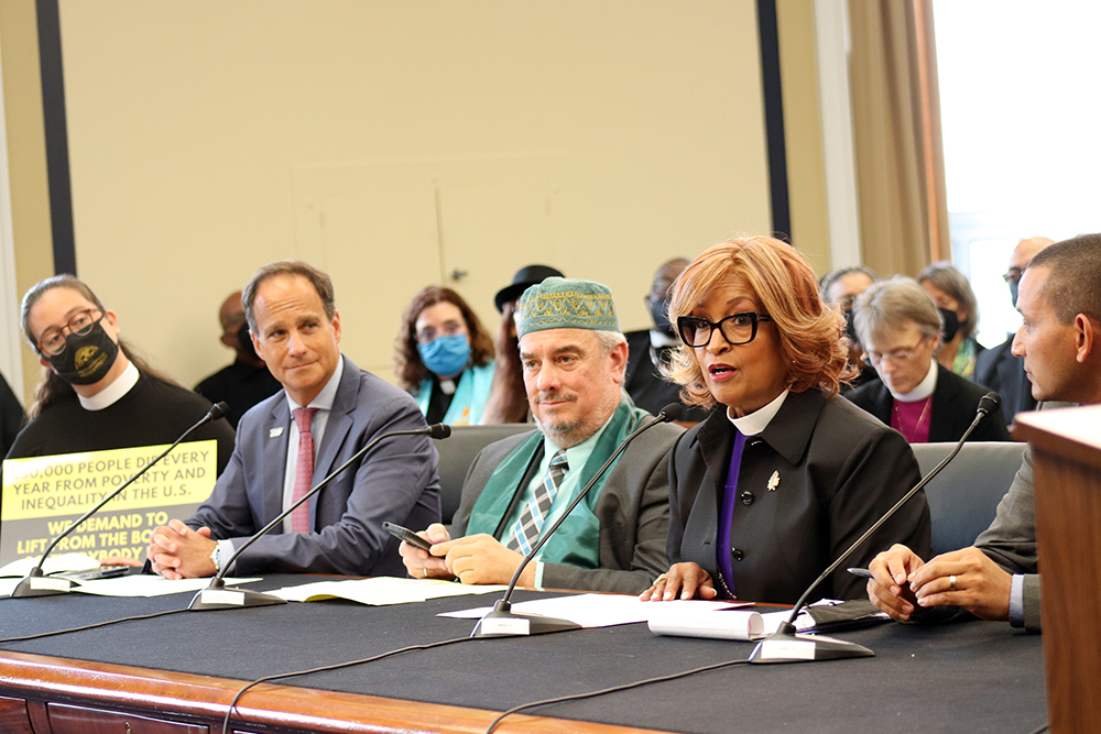 From left, the Rev. Liz Theoharis, Rabbi Jonah Pesner, Imam Saffet Catovic and Bishop Vashti McKenzie during the Poor People’s Campaign’s congressional briefing on Sept. 22, 2022, at the Rayburn House Office Building in Washington. (RNS/Adelle M. Banks)