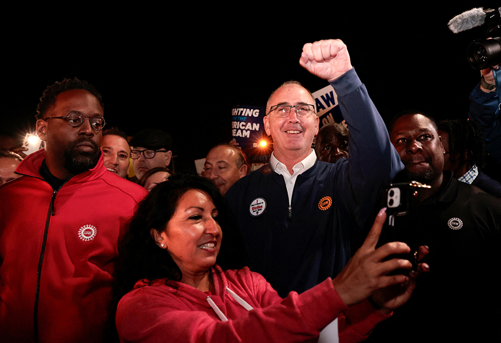 United Auto Workers union President Shawn Fain joins striking UAW members on the picket line at the Ford Michigan Assembly Plant, Sept. 15 in Wayne, Michigan. (OSV News/Reuters/Rebecca Cook)