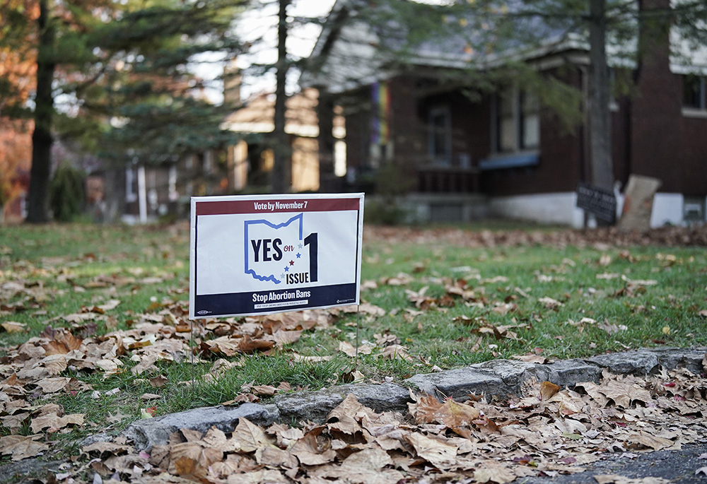 A sign supporting Issue 1 sits in a residential yard on Election Day, Nov. 7, in Cincinnati. Issue 1 declares an individual's right to "make and carry out one's own reproductive decisions," including birth control, fertility treatments, miscarriage and abortion. Ohio voted in favor of Issue 1. (AP photo/Joshua A. Bickel)