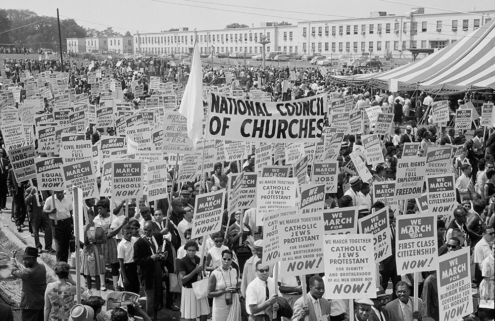 A banner for the National Council of Churches is seen among hundreds of signs carried by participants in the March on Washington for Jobs and Freedom Aug. 28, 1963. The march speakers included several religious leaders, including the Rev. Dr. Martin Luther King, who was a Baptist minister, and Archbishop Patrick O'Boyle of Washington, who offered the invocation. (OSV News/Courtesy of Library of Congress)