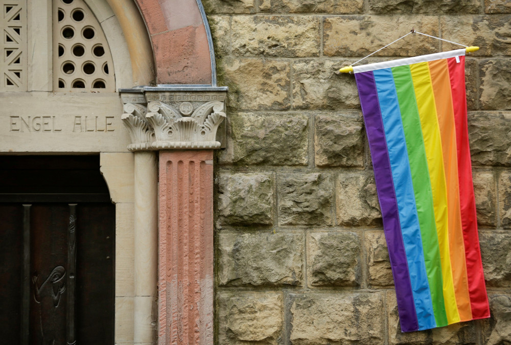 A rainbow flag is seen on the wall of a Catholic church in Cologne, Germany, May 10, 2021. (OSV News photo/Thilo Schmuelgen, Reuters)