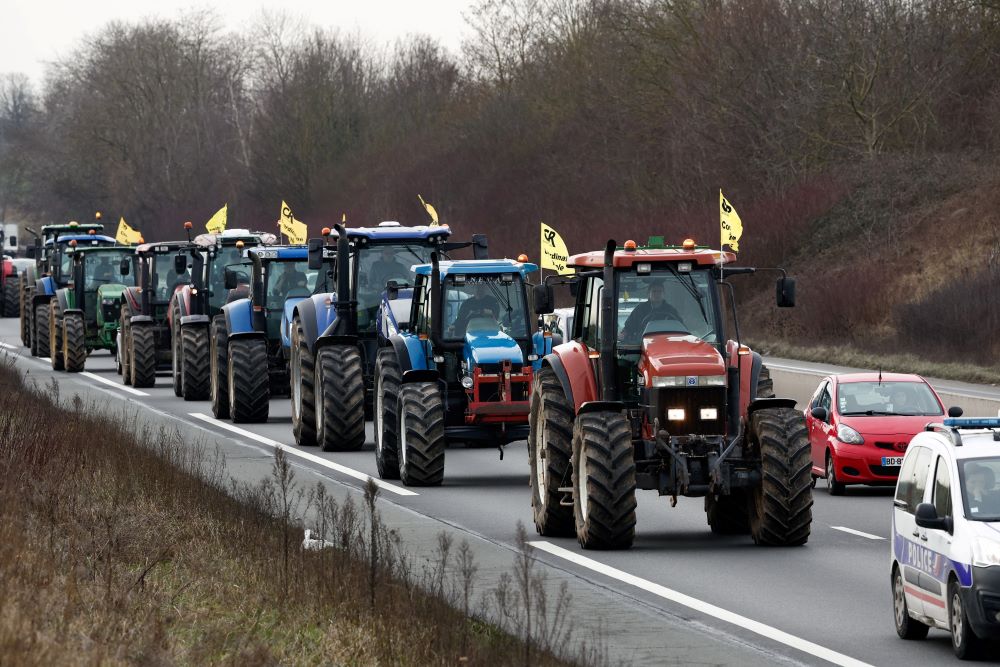 French farmers drive their tractors in a go-slow operation in Compans near Roissy Charles-de-Gaulle Airport Jan. 27, 2024, in a protest over price pressures, taxes and green regulation, grievances shared by farmers across Europe. (OSV News photo/Benoit Tessier, Reuters)