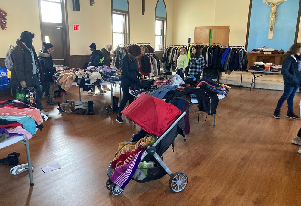 Clothing distribution takes place in the parish meeting hall of St. Thomas Aquinas Church. The hall is actually the original church, which was built in the late 1800s. (Courtesy of St. Thomas Aquinas Church)