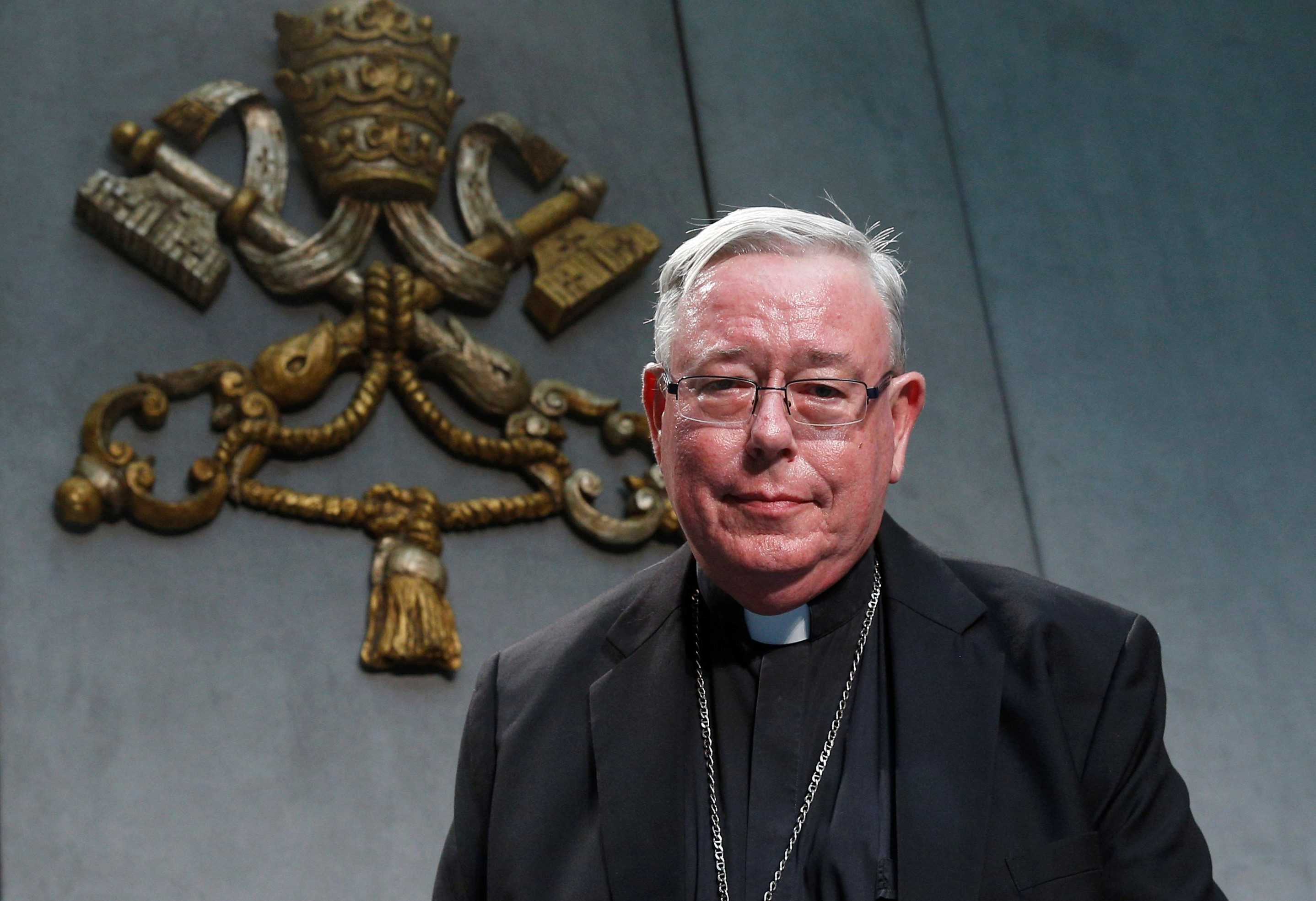 Cardinal Jean-Claude Hollerich of Luxembourg, relator general of the Synod of Bishops, arrives for a news conference to present an update on the synod process at the Vatican Aug. 26. (CNS/Paul Haring)