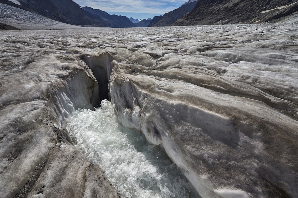 A new study shows that melting of the world's glaciers, like this one in the Swiss Alps, and polar ice caps has accelerated since the 1990s. (CNS photo/Denis Balibouse, Reuters)