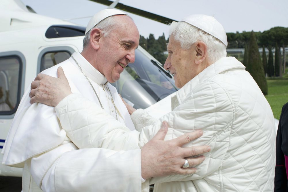 Pope Francis embraces emeritus Pope Benedict XVI at the papal summer residence in Castel Gandolfo, Italy, March 23, 2013. Pope Francis traveled by helicopter from the Vatican to Castel Gandolfo for a private meeting with the retired pontiff. (CNS/Reuters/L'Osservatore Romano)