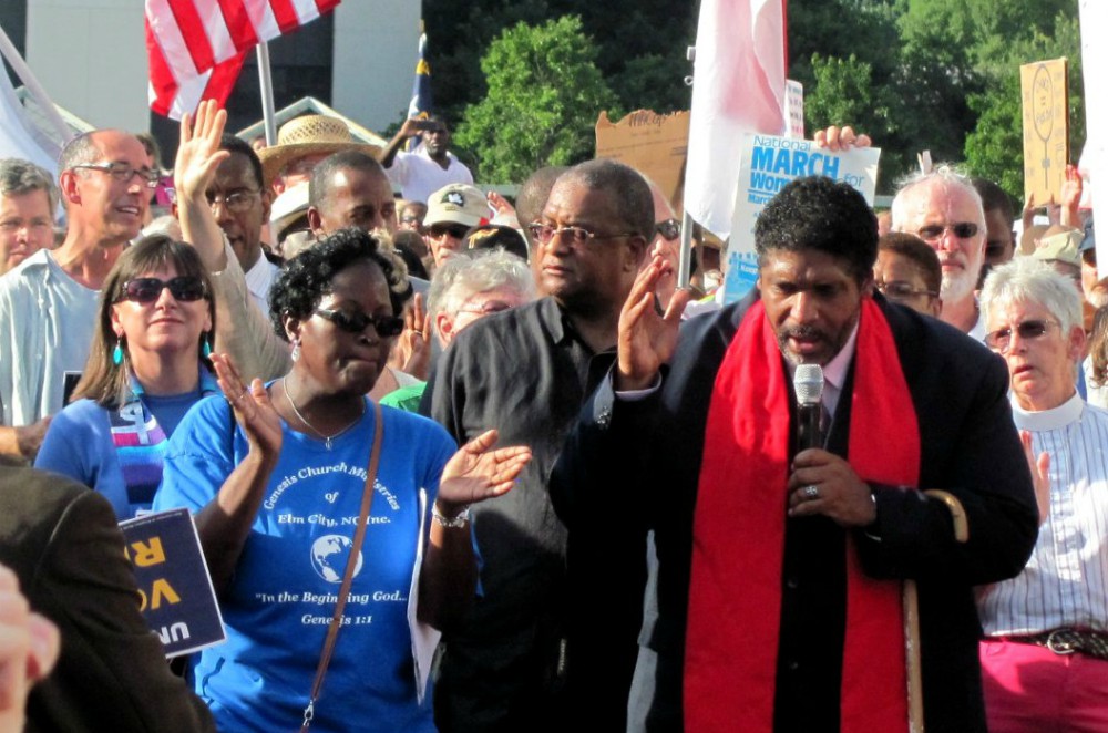 In this 2013 file photo, the Rev. William Barber speaks at a Moral Mondays rally in North Carolina. (Wikimedia Commons/twbuckner)
