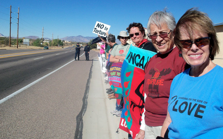 From right: Loretto co-member Maureen Flannagan, Sr. Alicia Ramirez, and co-members Kim Klein and Martha Crawley join a protest against torture on Nov. 14, 2010, at Fort Huachuca, Ariz. (Mary Ann McGivern)
