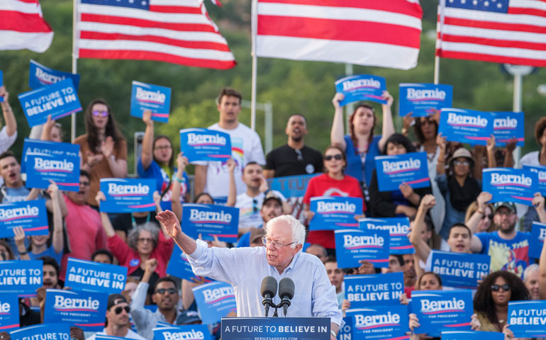 Vermont Sen. Bernie Sanders holds a rally outside of Robert F. Kennedy Memorial Stadium in Washington, D.C., June 9. (Newscom/CQ Roll Call/Tom Williams)