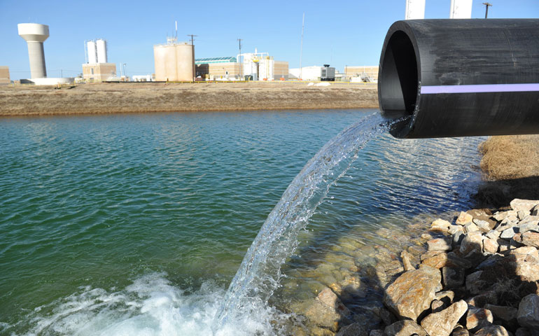 Water from the River Road Waste Water Treatment Plant flows from a pipe as part of a purification process in Wichita Falls, Texas, in January. The city is preparing its Water Reuse Project for testing by the Texas Commission on Environmental Quality. (AP Photo/Wichita Falls Times Record News/Torin Halsey)