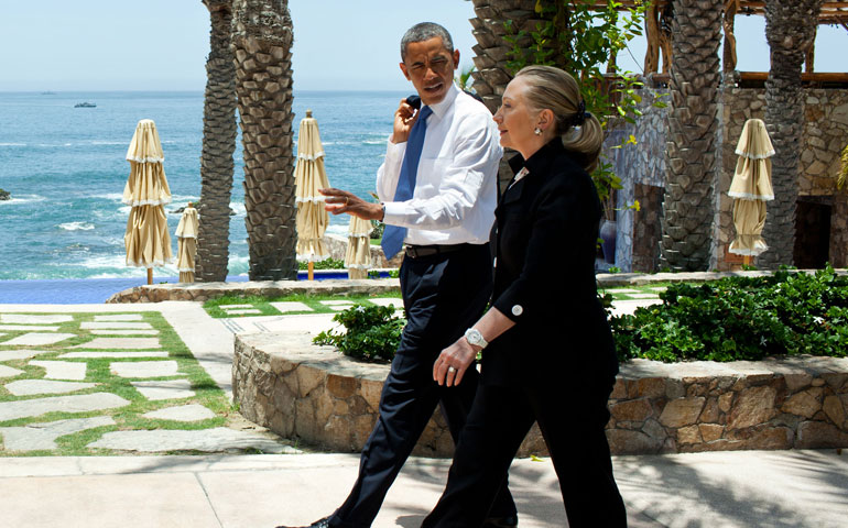 President Barack Obama walks with Secretary of State Hillary Clinton in Mexico in 2012. (Official White House/Pete Souza)