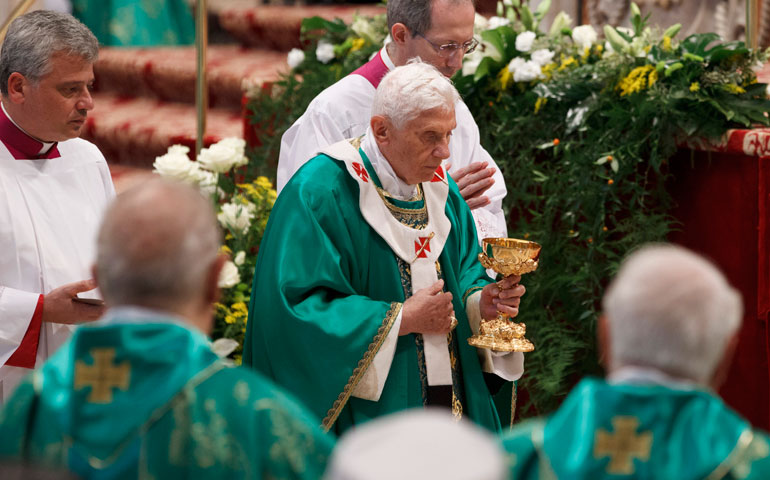Pope Benedict XVI celebrates the closing Mass of the Synod of Bishops on the new evangelization in St. Peter’s Basilica at the Vatican Oct. 28. (CNS/Paul Haring)