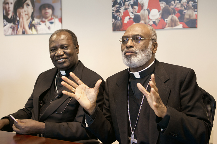 Ghanaian Archbishop Charles G. Palmer-Buckle, right, and Cardinal Polycarp Pengo of Dar es Salaam, Tanzania, in a 2011 photo. (CNS photo/Nancy Wiechec)