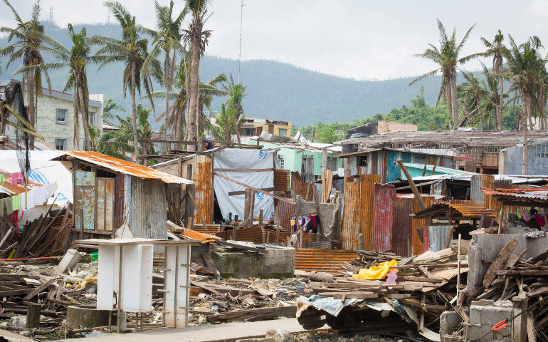 This photo taken Feb. 10 from the home of Emmanuel and Maria Rosevilla Margate shows homes left in ruins in Tacloban, Philippines, after Typhoon Haiyan struck Nov. 8, 2013, killing thousands and destroying many homes. (CNS photo/Tyler Orsburn)