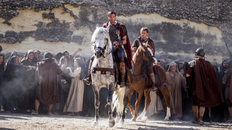 Joseph Fiennes and Tom Felton star in a scene from the movie "Risen." (CNS photo/Columbia Pictures)