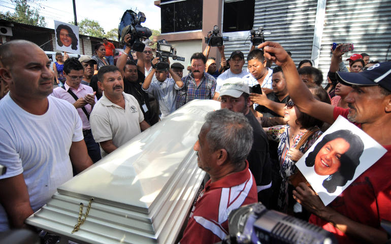 People carry the coffin of indigenous leader and environmental activist Berta Caceres after a five-hour autopsy at the Forensic Medicine Center in Tegucigalpa, Honduras, March 3. (CNS photo/Stringer, EPA)