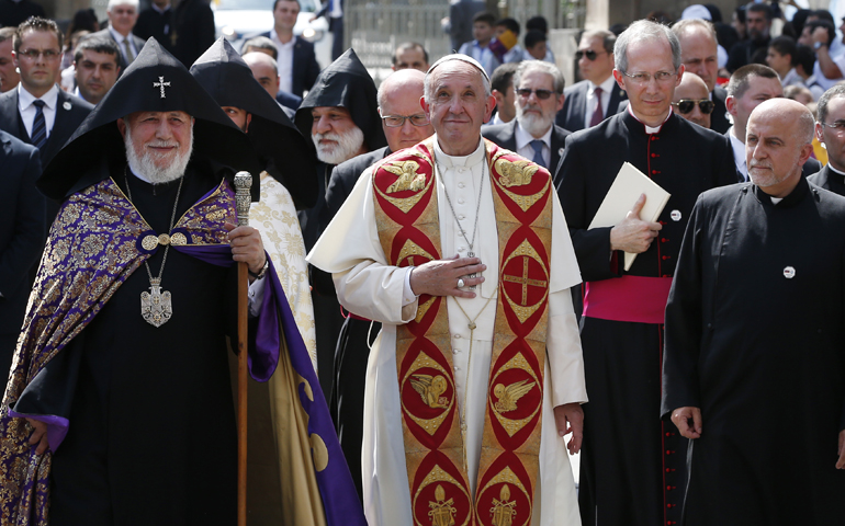 Catholicos Karekin II, patriarch of the Armenian Apostolic Church, and Pope Francis arrive to visit the Armenian Apostolic Cathedral at Etchmiadzin in Vagharshapat, Armenia, June 24. (CNS/Paul Haring)