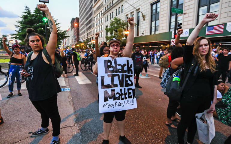 People in Chicago demonstrate July 11 after a string of nationwide police shootings of African-Americans and the slaying of police officers in Dallas. (CNS photo/Tannen Maury, EPA)