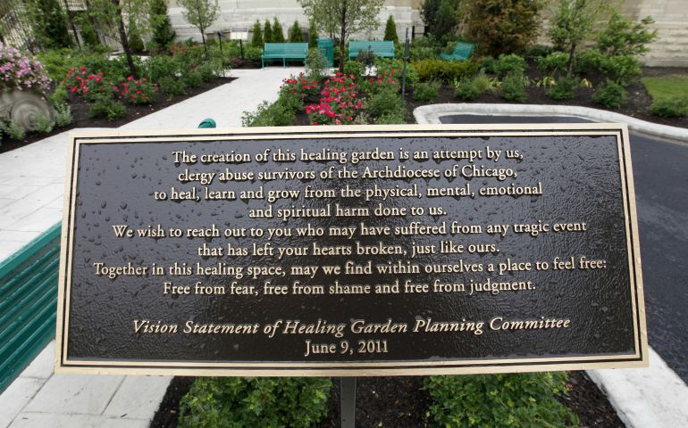 A sign stands at the entrance of a healing garden on the grounds of Holy Family Church in Chicago in this June 9, 2011, file photo. The garden was created as a place of prayer and healing for survivors of clerical sexual abuse, their families and the greater Catholic Church. (CNS photo/Karen Callaway, Catholic New World)