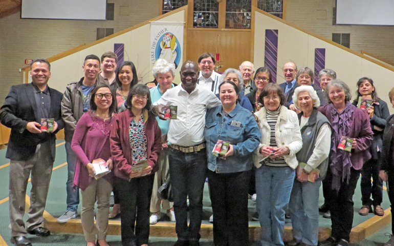 Thomas Awiapo (center) poses with members of St. Lawrence the Martyr Parish in Santa Clara, Calif. after sharing how the Operation Rice Bowl program of Catholic Relief Services* changed his life. (Diocese of San Jose)