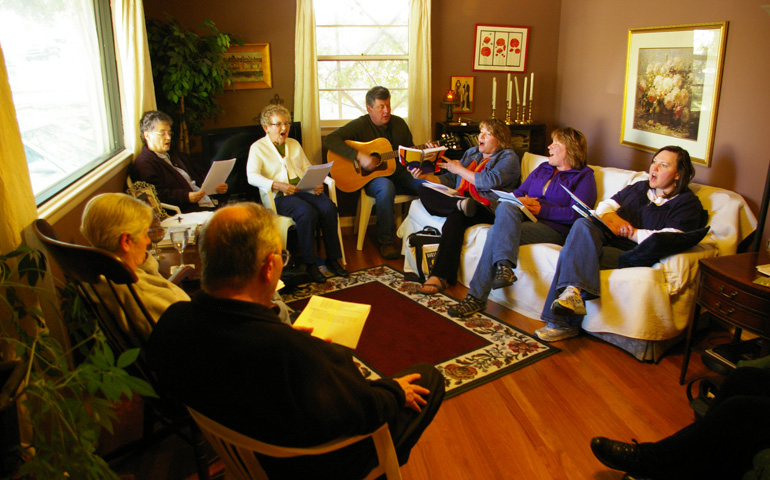 Members of the Lincoln, Neb., Call to Action group sing during a prayer liturgy during their Oct. 7, 2012, meeting at the home of Rachel Pokora. (NCR photo/Joshua J. McElwee)