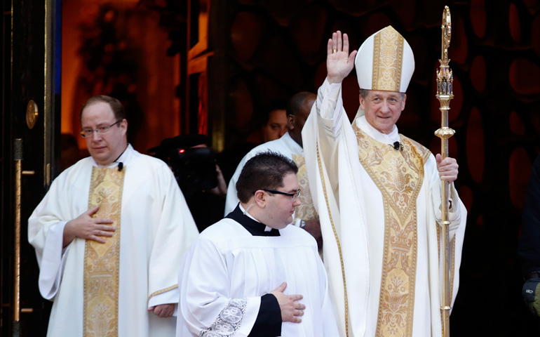 Archbishop Blase Cupich exits Holy Name Cathedral after his installation as Chicago's new archbishop Tuesday. (CNS/Reuters/Andrew Nelles)