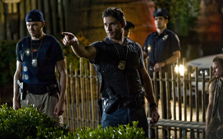 Eric Bana, center, and Joel McHale, left, in a scene from "Deliver Us From Evil" (CNS/Sony Picture/Andrew Schwartz)