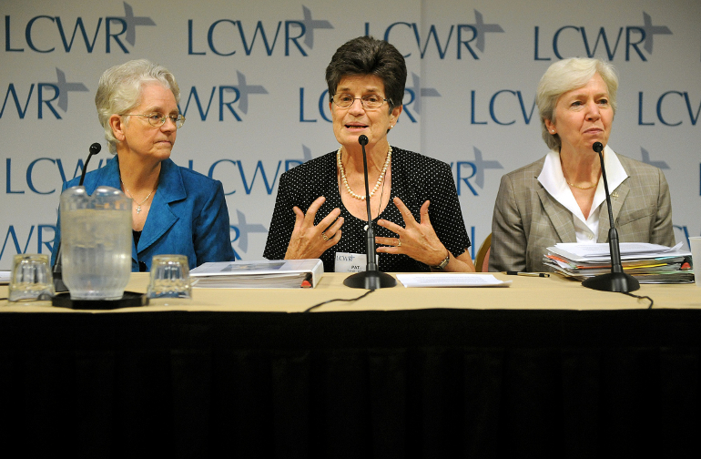 Franciscan Sister Pat Farrell, center, president of the Leadership Conference of Women Religious, addresses a press conference near the end of the group's annual assembly Aug. 10 in St. Louis. Joining her was president-elect Franciscan Sister Florence De acon, left, and Dominican Sister Mary Hughes, right, past president of the organization. (CNS photo/Sid Hastings)