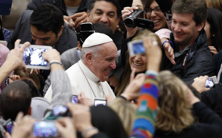 Pope Francis arrives to lead his general audience Jan. 7 in Paul VI hall at the Vatican. (CNS/Paul Haring)