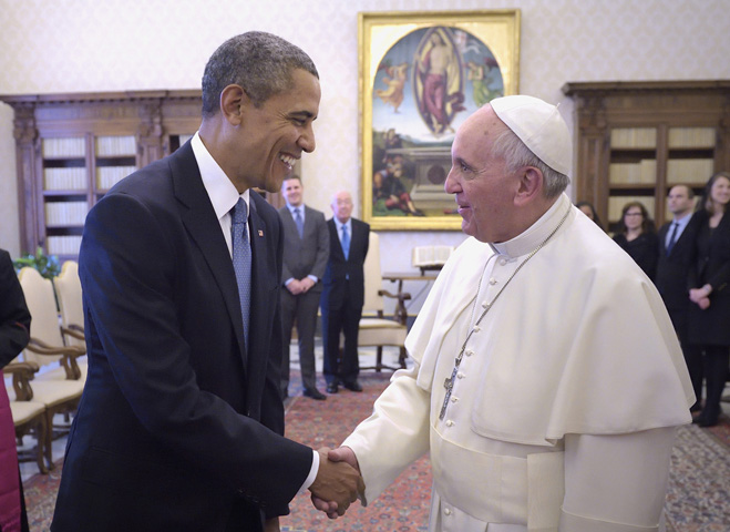 U.S. President Barack Obama shakes hands with Pope Francis during a March 27 private audience at the Vatican. (CNS/Stefano Spaziani, pool)