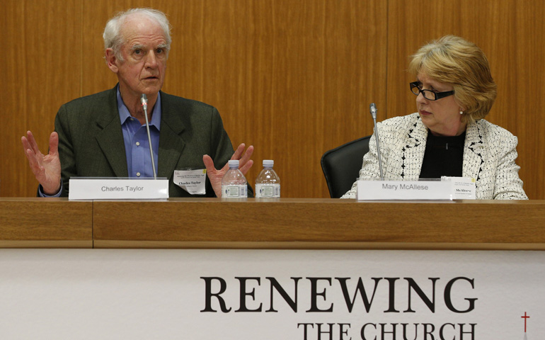 Charles Taylor, professor emeritus of philosophy at McGill University in Canada, and Mary McAleese, president of Ireland from 1997 to 2011, at "Renewing the Church in a Secular Age" on Thursday at the Pontifical Gregorian University in Rome. (CNS/Paul Haring)