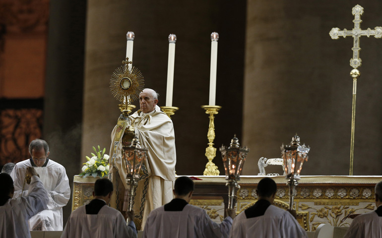 Pope Francis leads a blessing during a vigil to pray for peace Saturday in Syria in St. Peter's Square at the Vatican. (CNS/Paul Haring)
