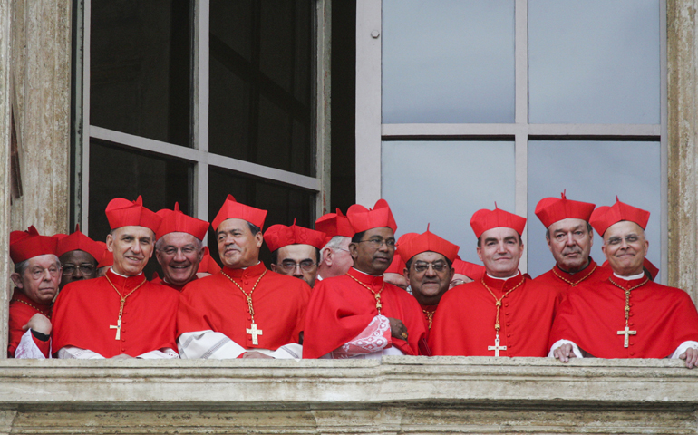 Cardinals gather on a side balcony of St. Peter's Basilica as they await the public introduction of the new pope April 19, 2005. (CNS/Nancy Wiechec) 