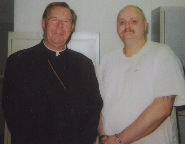 Archbishop Daniel Buechlein, left, and David Paul Hammer, on Oct. 27, 2000, Hammer's confirmation and first Eucharist.