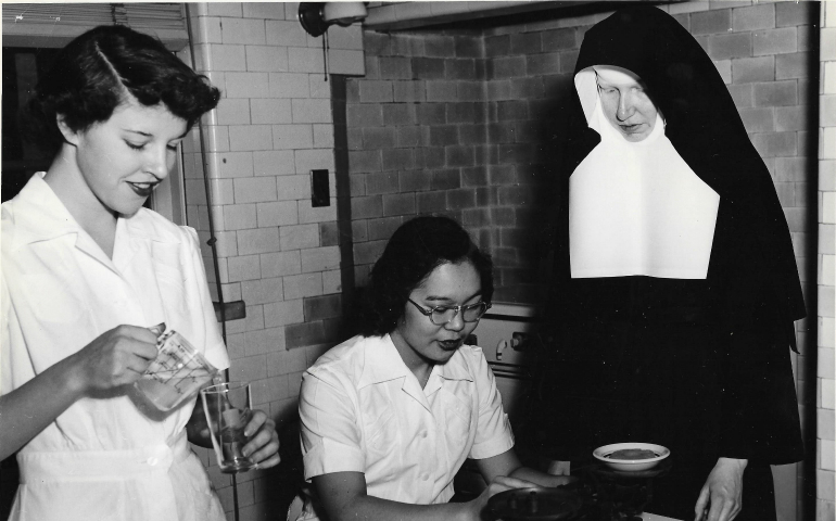 Things have certainly changed at sister-founded US colleges since this photo of a 1951 home economics class was taken. Pictured is Sr. Miriam Clare Heskamp with two students. (Courtesy of Marian University)