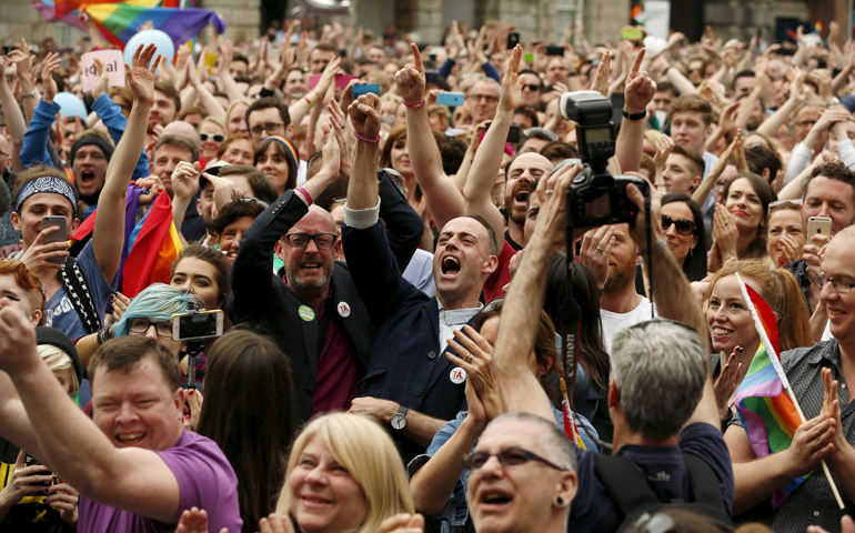 People in Dublin react to Ireland's vote in favor of allowing same-sex marriage May 23. (CNS/Reuters/Cathal McNaughton)